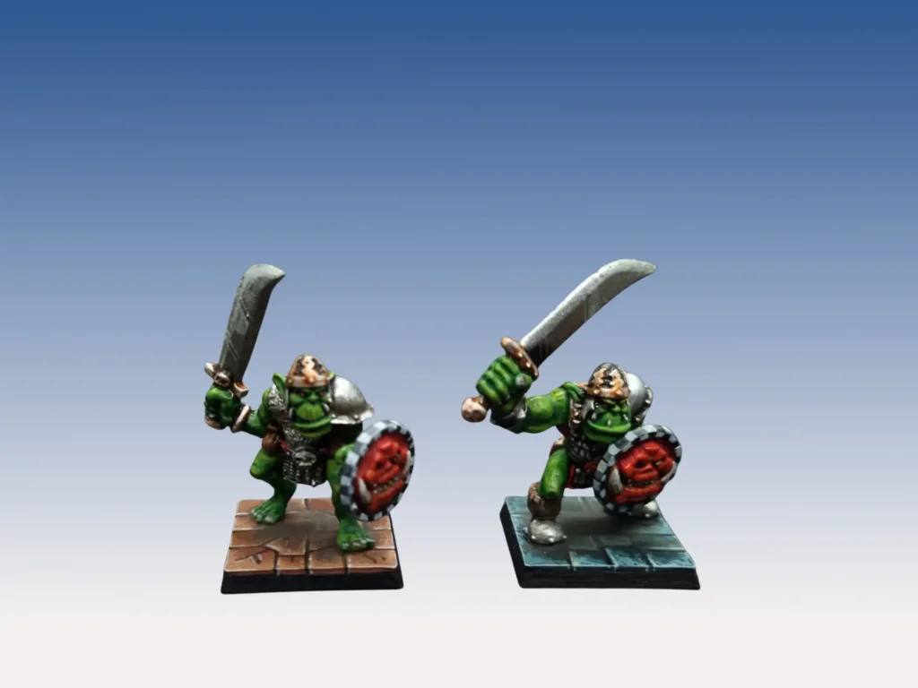 Kostos orques Warhammer Quest Lair of the Orc Lord - guerriers orques peau verte sombre avec boucliers embossés